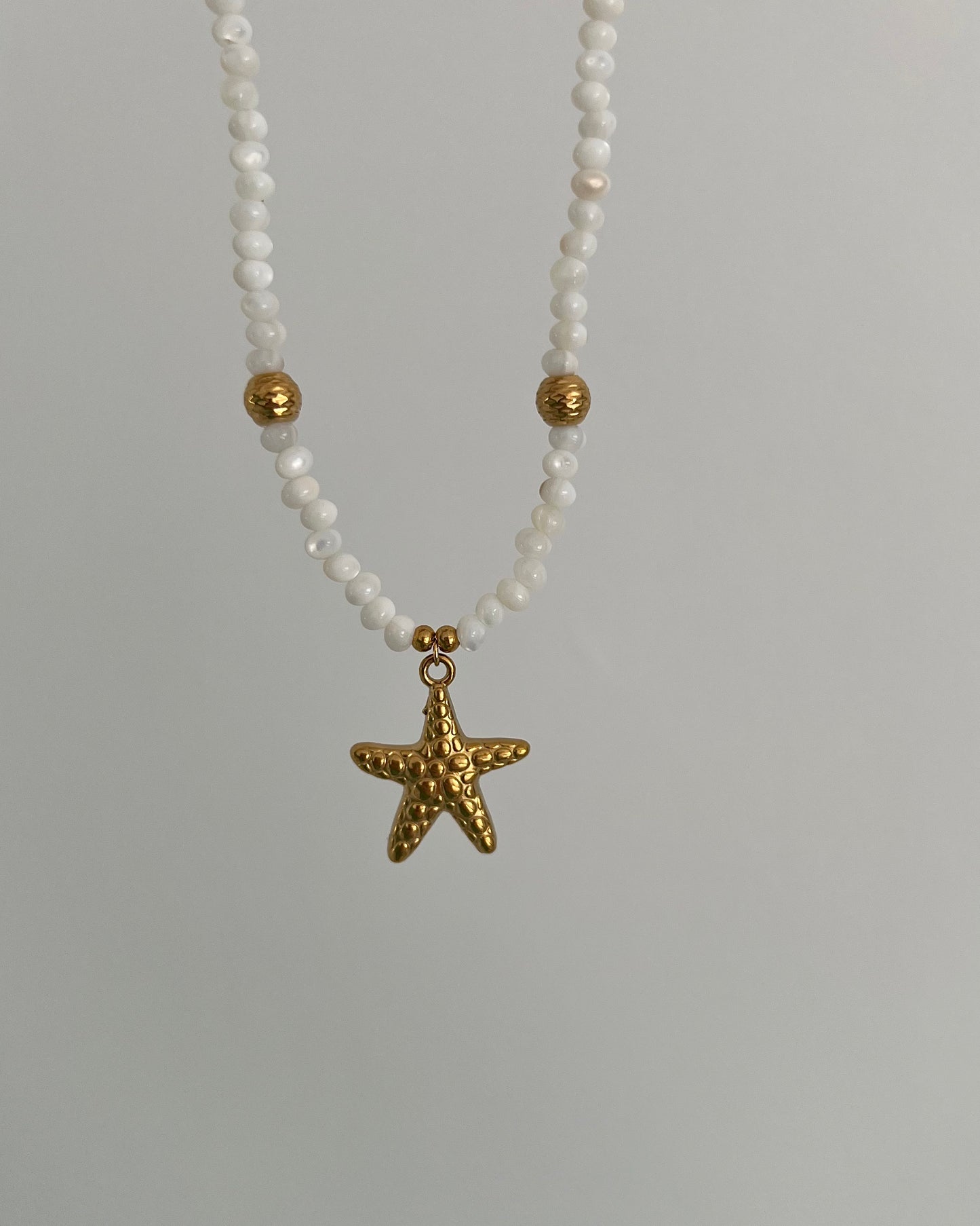 COLLIER ⟩ STELLA